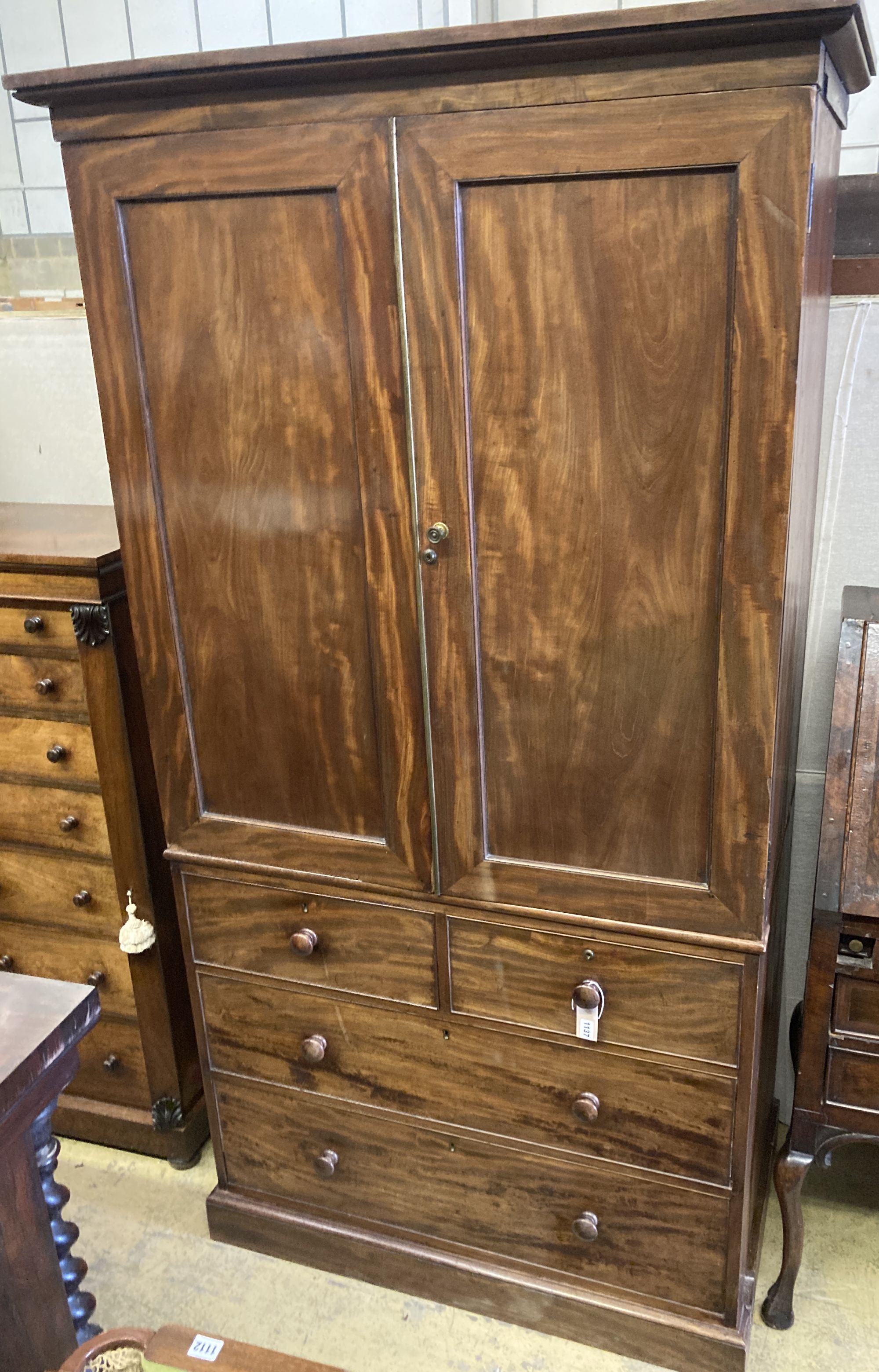 A Victorian mahogany linen press, formerly part of a larger wardrobe, width 112cm depth 66cm height 212cm
